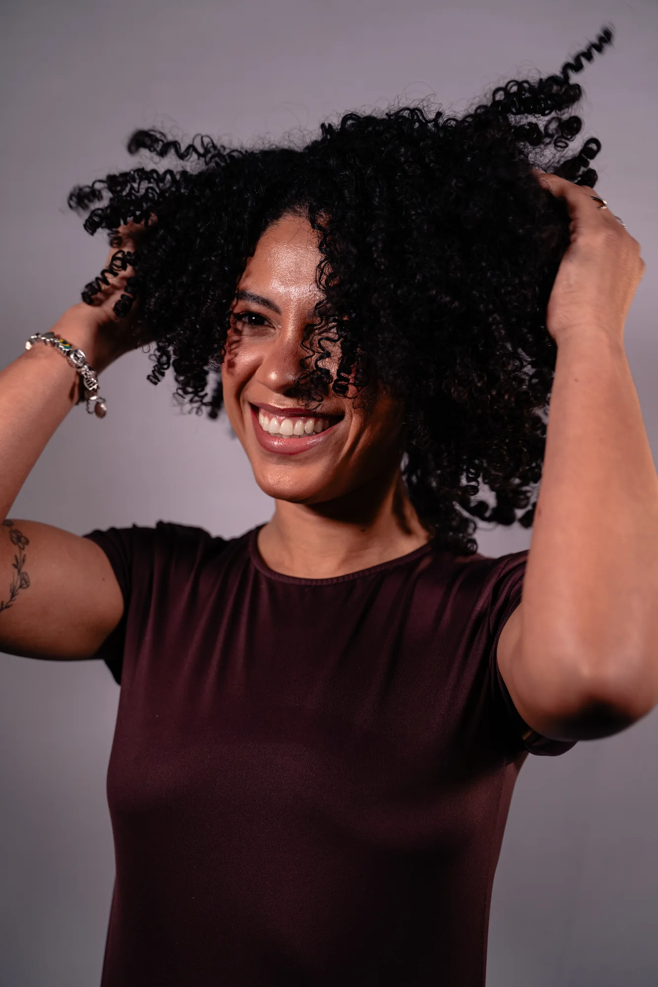 Portrait of a smiling model with natural curls