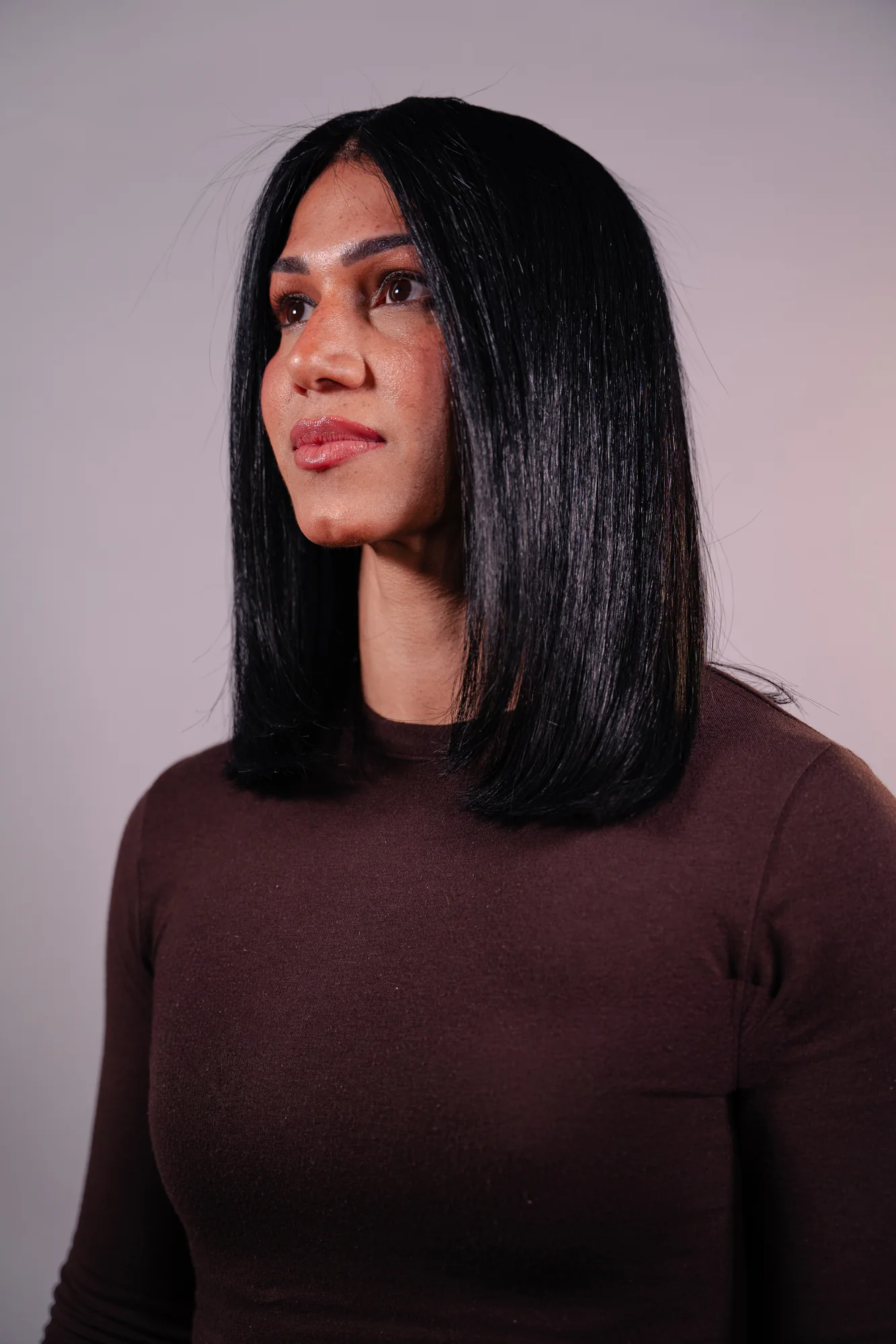 Model with sleek dark hair photographed for the campaign