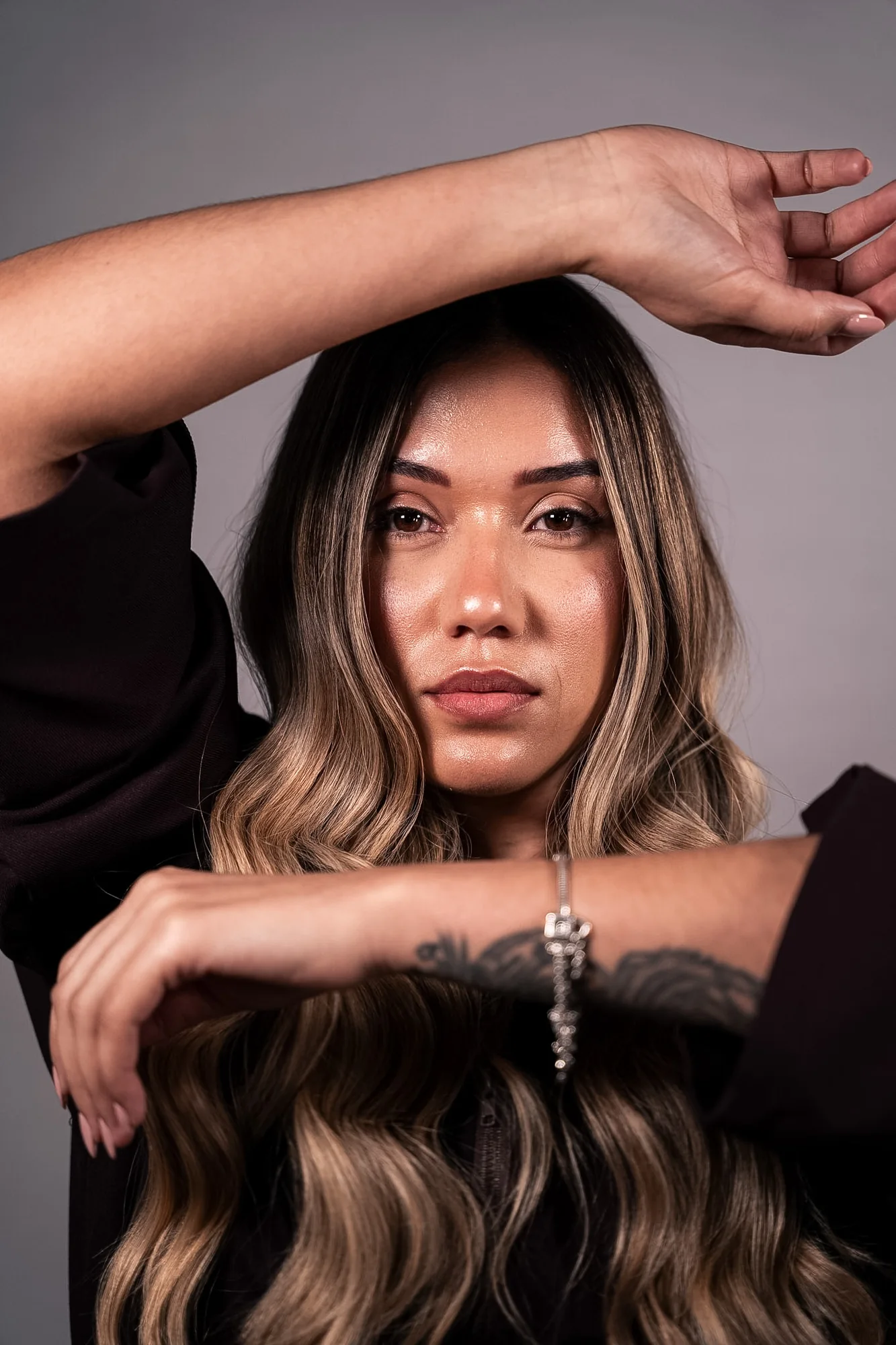 Beauty portrait framed by long highlighted hair