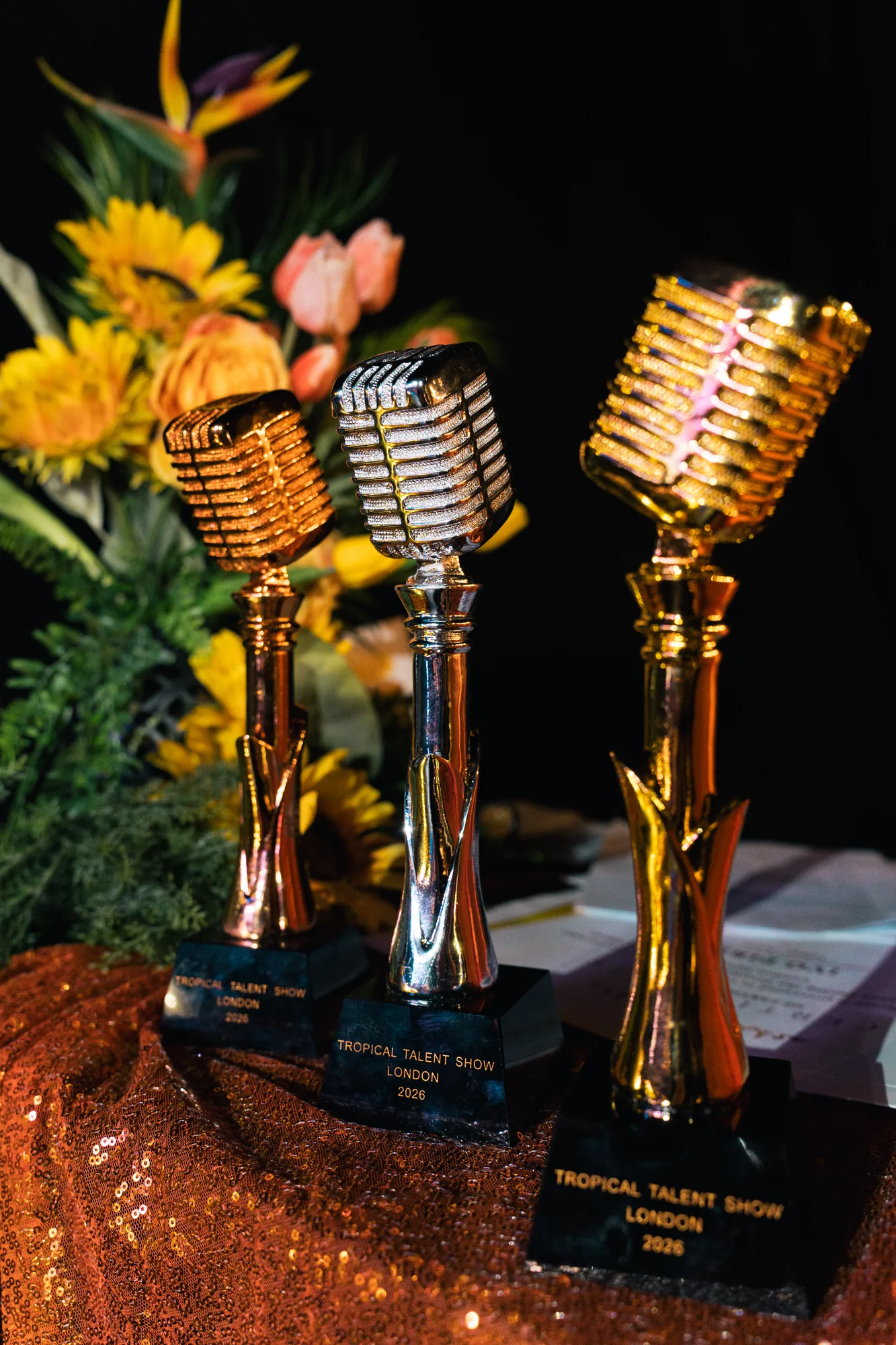 Gold trophies displayed at the Tropical Talent Show