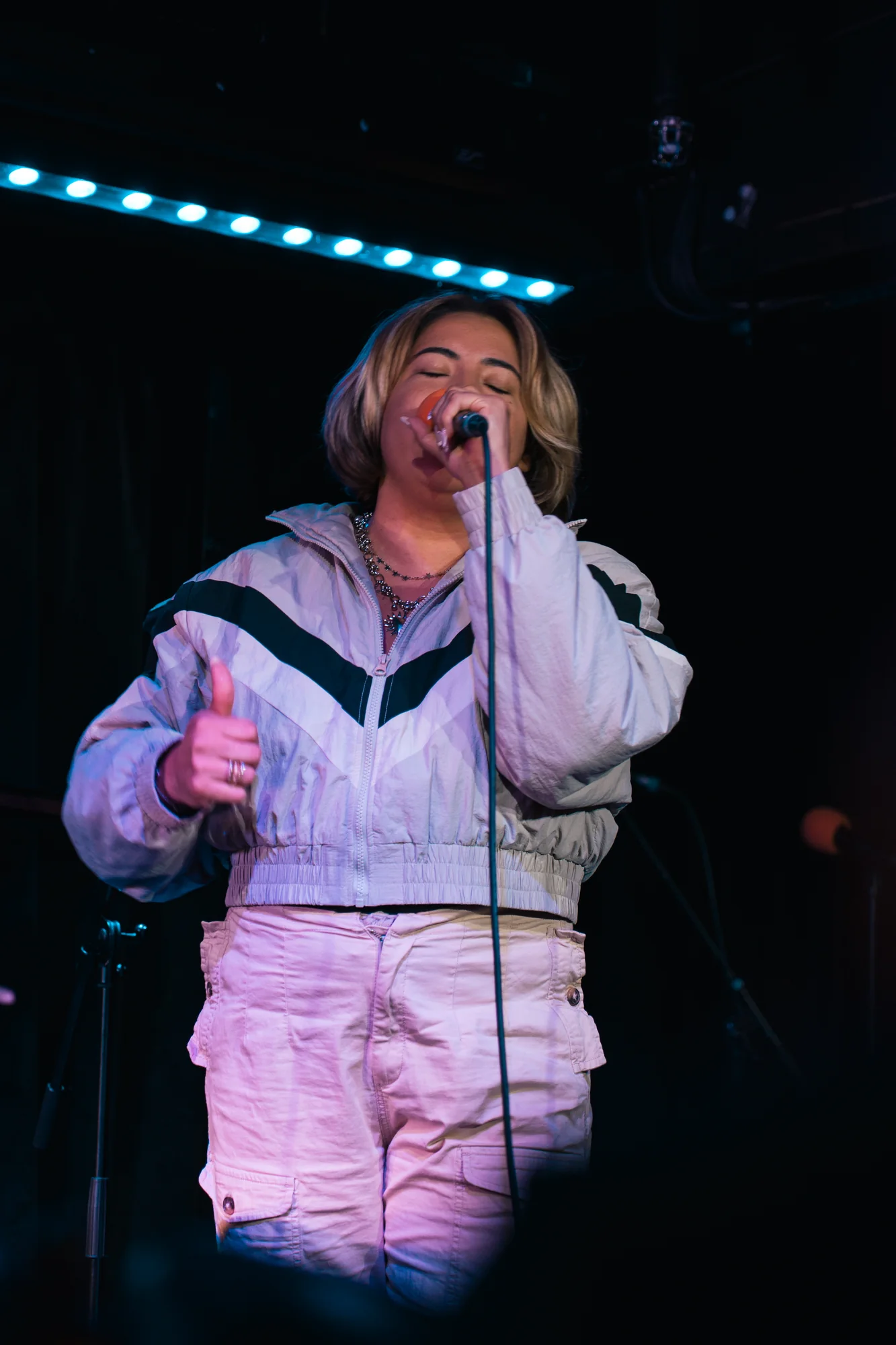 Singer performing live on stage
