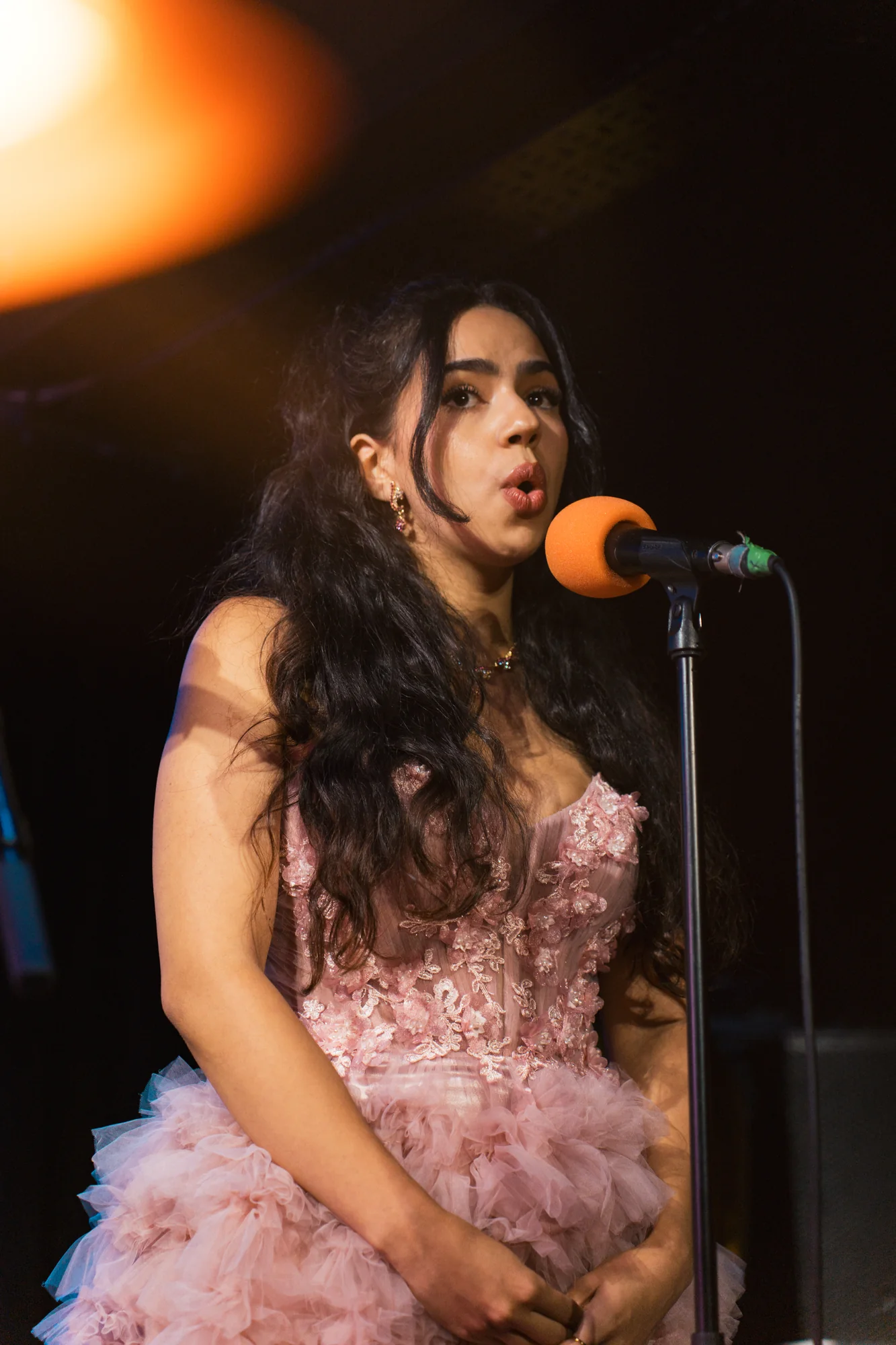 Female vocalist performing at the Tropical Talent Show