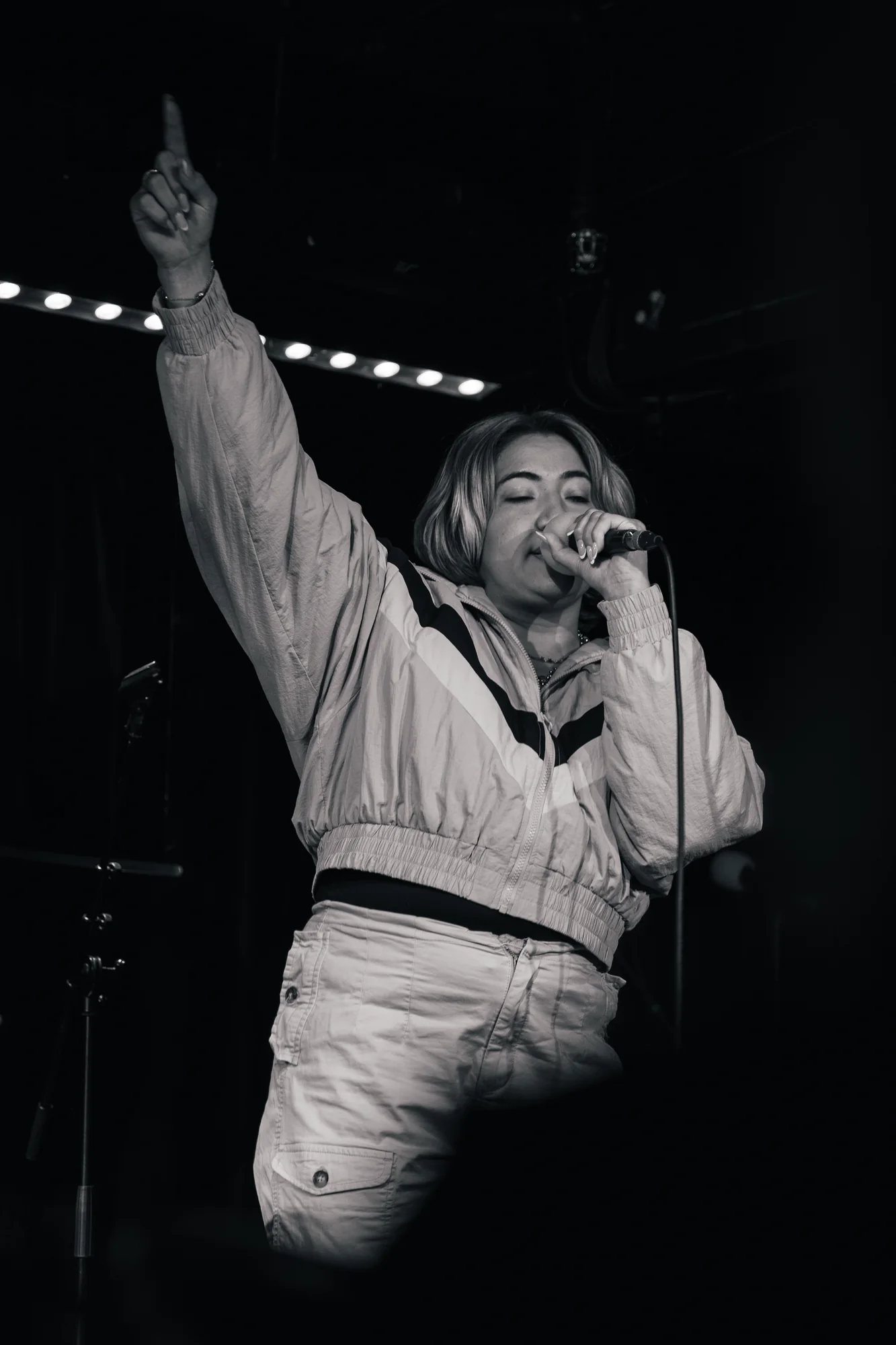 Singer celebrating a live performance on stage
